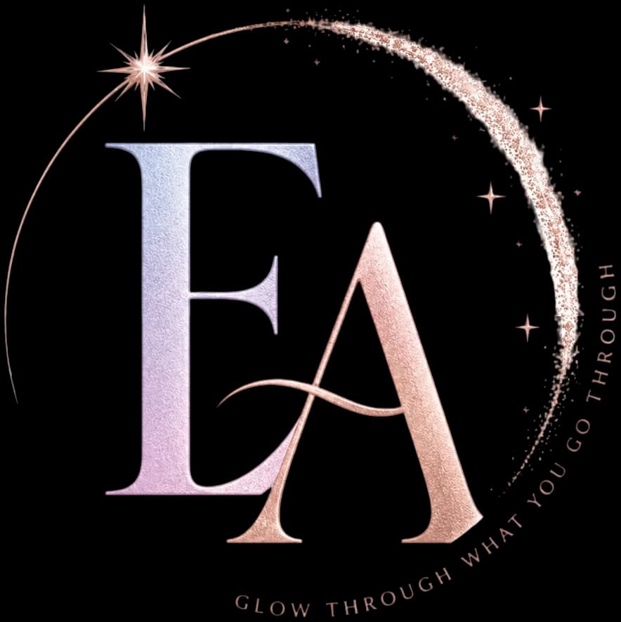 Enchanted Artistry monogram carrying the Glow Through What You Go Through tagline